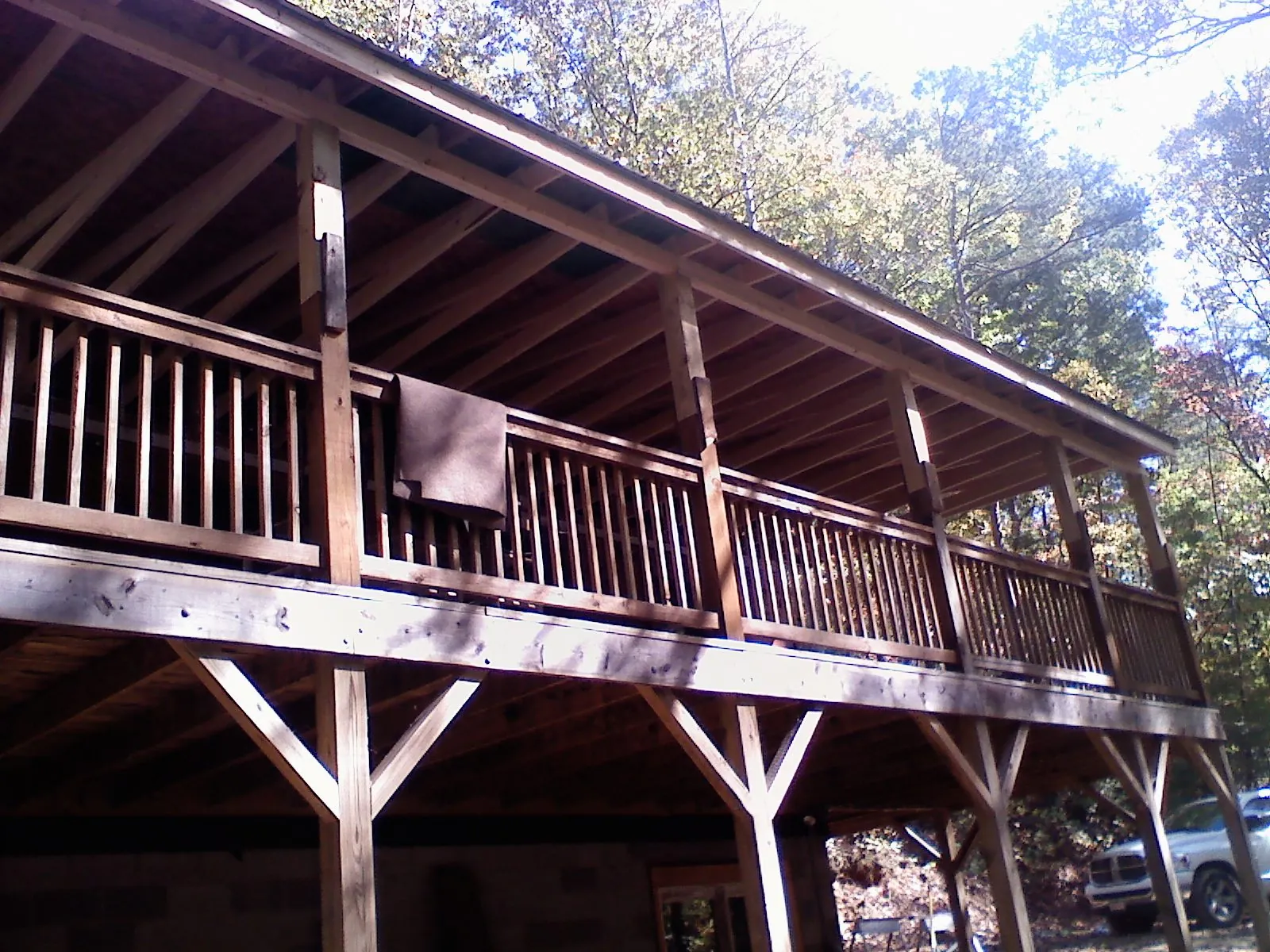 Timber framing under a new elevated porch and deck — Roof Leak Repair in Desoto by Roofing Brothers
